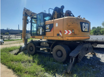 Wheel excavator CATERPILLAR MH3024