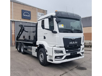 Skip loader truck