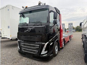 Dropside/ Flatbed truck Volvo Arbeitsbühnen Baumaschinentransporter mit Rampen: picture 2 Dropside/ Flatbed truck Volvo Arbeitsbühnen Baumaschinentransporter mit Rampen: picture 2
