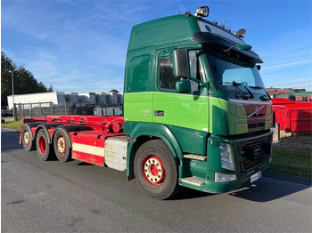 Skip loader truck Volvo FM500 8x2*6 rigid pusher-tag tridem: picture 2