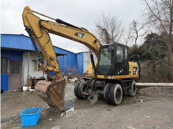 Wheel excavator CATERPILLAR M312
