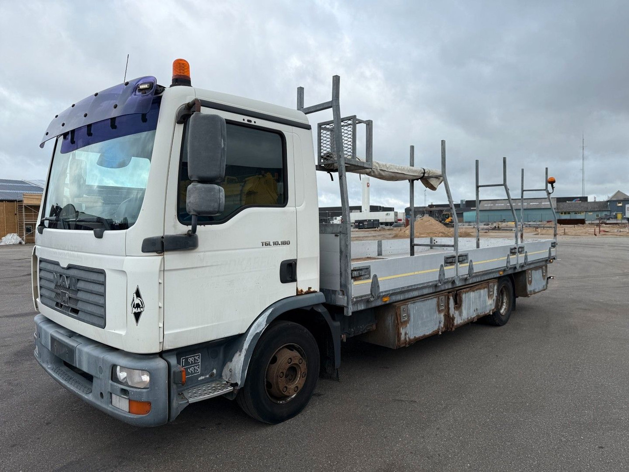 MAN TGL 10.180 4x2 Flatbed 6,,80 m. Euro 3 - Dropside/ Flatbed truck: picture 1 MAN TGL 10.180 4x2 Flatbed 6,,80 m. Euro 3 - Dropside/ Flatbed truck: picture 1
