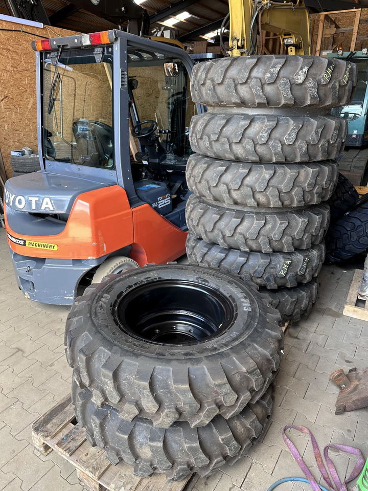 Apollo 10.00 - 20 Apollo Kompletträder - Complet tires - Tire for Wheel excavator: picture 1 Apollo 10.00 - 20 Apollo Kompletträder - Complet tires - Tire for Wheel excavator: picture 1