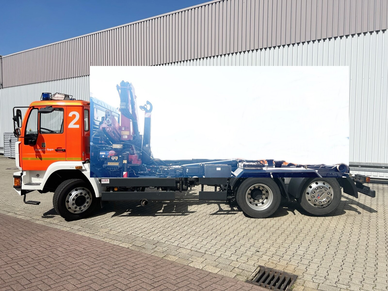 MAN 25/18.284 6x2-4 LL 25/18.284 6x2-4 LL,Kran HMF 1113 K3, Funk, Retarder - Hook lift truck, Crane truck: picture 1 MAN 25/18.284 6x2-4 LL 25/18.284 6x2-4 LL,Kran HMF 1113 K3, Funk, Retarder - Hook lift truck, Crane truck: picture 1