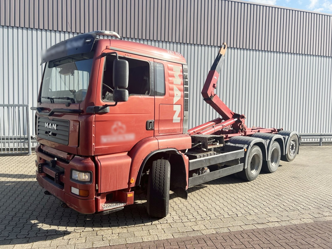 MAN TGA 25.530 8x4-4 BL, Lift-/Lenkachse TGA 25.530 8x4-4 BL, Lift-/Lenkachse - Hook lift truck: picture 1 MAN TGA 25.530 8x4-4 BL, Lift-/Lenkachse TGA 25.530 8x4-4 BL, Lift-/Lenkachse - Hook lift truck: picture 1
