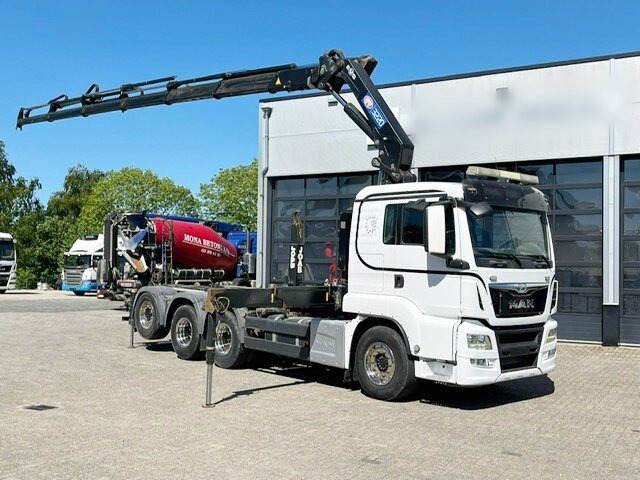 MAN TGS 35.500 8x4-4 BL TGS 35.500 8x4-4 BL, Lenk-/Liftachse, Kran HMF 3220-K6, Funk - Hook lift truck, Crane truck: picture 1 MAN TGS 35.500 8x4-4 BL TGS 35.500 8x4-4 BL, Lenk-/Liftachse, Kran HMF 3220-K6, Funk - Hook lift truck, Crane truck: picture 1