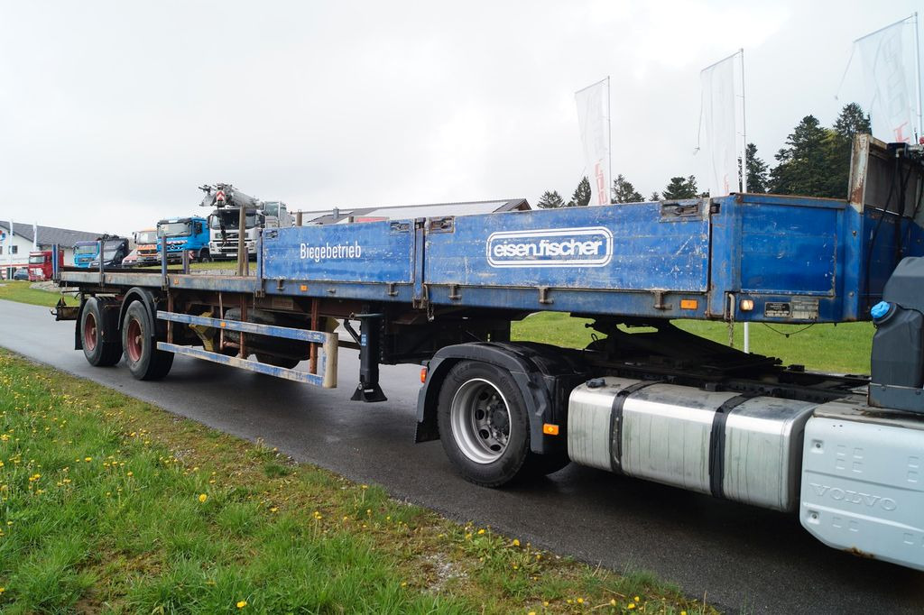 Unterholzner ULSZ 20/E Lenkachse Unterholzner ULSZ 20/E Lenkachse - Dropside/ Flatbed semi-trailer: picture 1 Unterholzner ULSZ 20/E Lenkachse Unterholzner ULSZ 20/E Lenkachse - Dropside/ Flatbed semi-trailer: picture 1