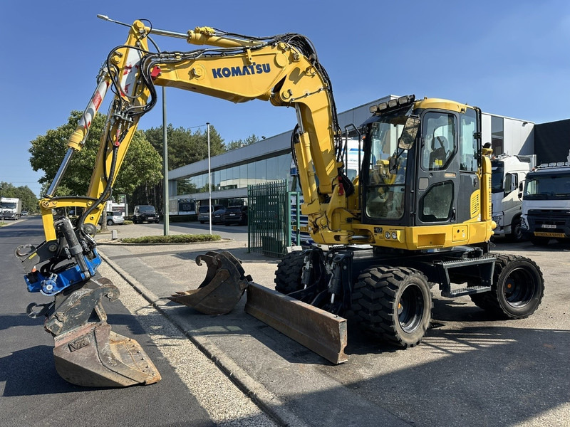 Komatsu PW 118 MR-11 14.3T - SMP ROTOTILT - *2413h* - CENTRAL GREASING - BLADE - 3 BUCKETS - TOP CONDITION - BE MACHINE - Wheel excavator: picture 2 Komatsu PW 118 MR-11 14.3T - SMP ROTOTILT - *2413h* - CENTRAL GREASING - BLADE - 3 BUCKETS - TOP CONDITION - BE MACHINE - Wheel excavator: picture 2