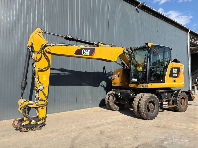 Cat M315F - With OilQuick - Wheel excavator: picture 1 Cat M315F - With OilQuick - Wheel excavator: picture 1