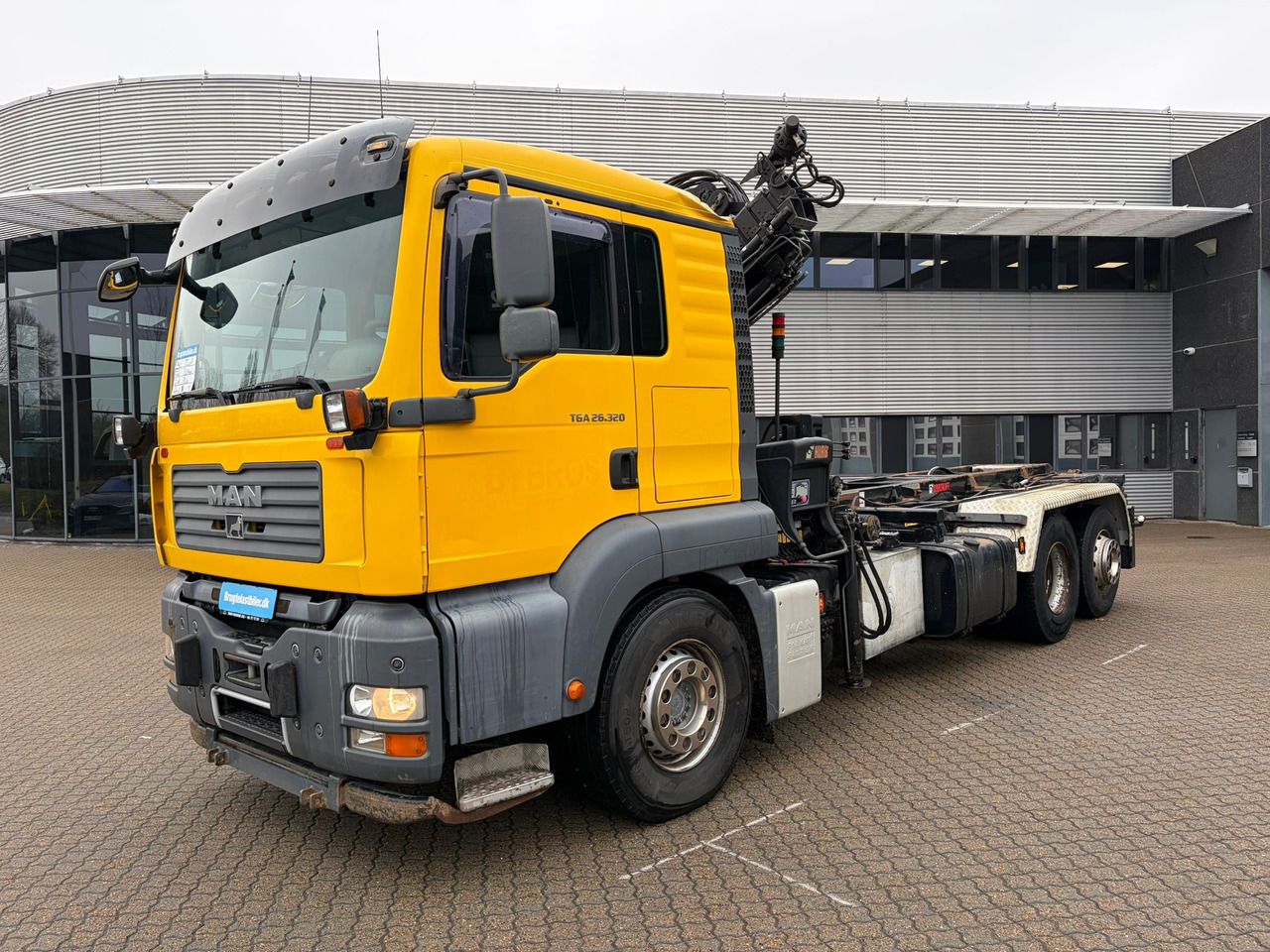 MAN TGA 26.320 - Container transporter/ Swap body truck, Crane truck: picture 1 MAN TGA 26.320 - Container transporter/ Swap body truck, Crane truck: picture 1