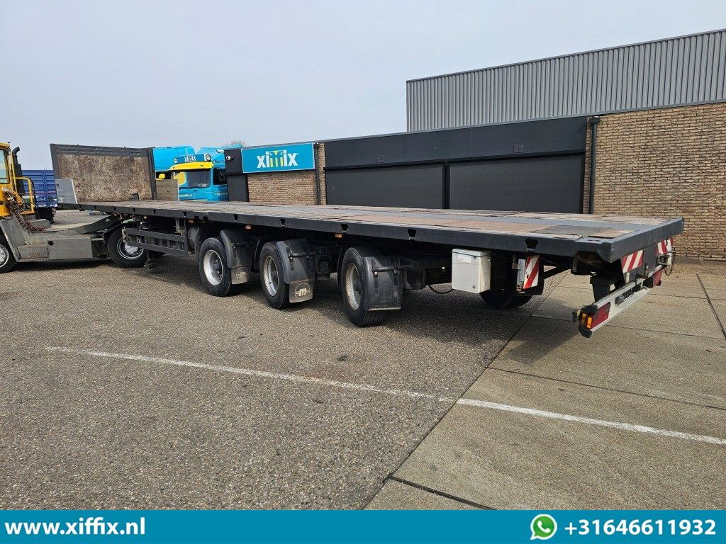 Meusburger 3-ass. Vlakke uitschuifbare oplegger / 2x gestuurd - Dropside/ Flatbed semi-trailer: picture 3 Meusburger 3-ass. Vlakke uitschuifbare oplegger / 2x gestuurd - Dropside/ Flatbed semi-trailer: picture 3