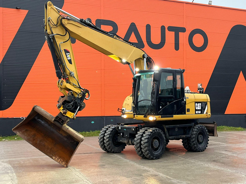 Caterpillar M316D / ROTOTILT/ AC / CENTRAL LUBRICATION / + EXTRA BUCKET - Wheel excavator: picture 1 Caterpillar M316D / ROTOTILT/ AC / CENTRAL LUBRICATION / + EXTRA BUCKET - Wheel excavator: picture 1