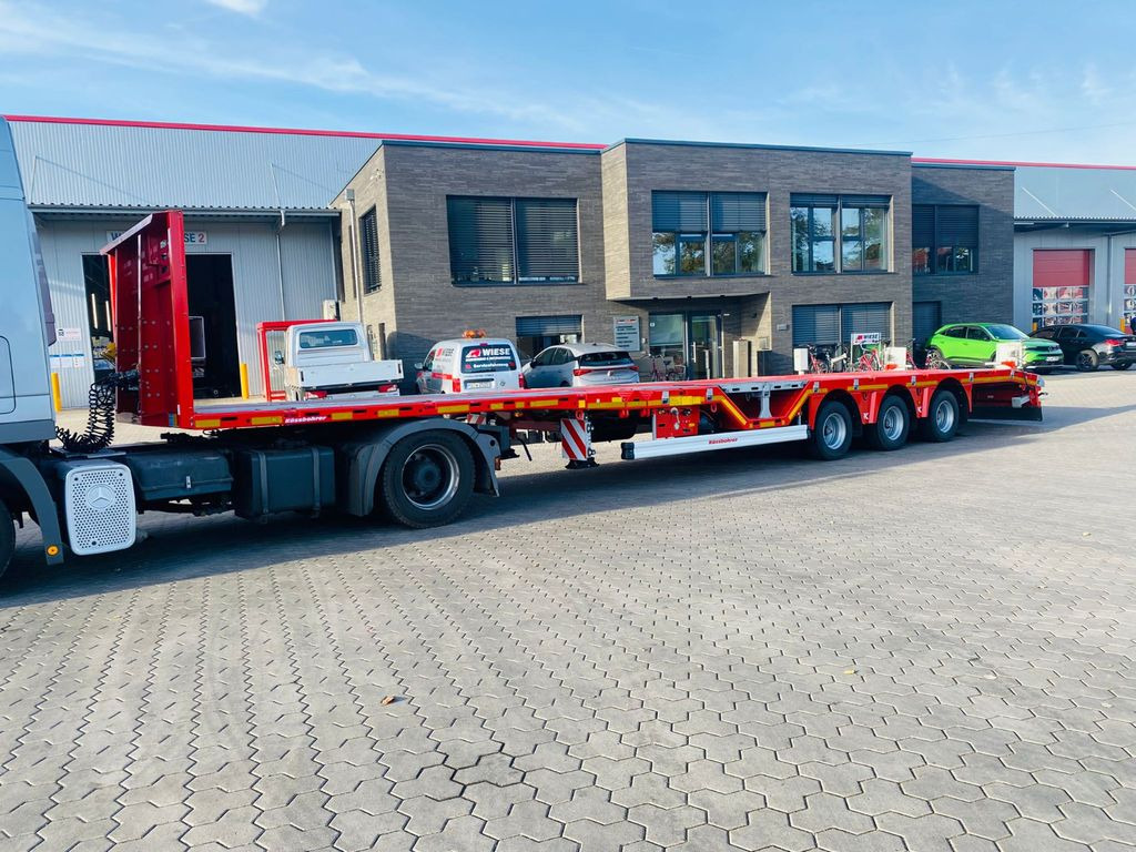 Kässbohrer Mega Tele HD Plattform Auflieger mit Radmulden - Dropside/ Flatbed semi-trailer: picture 1 Kässbohrer Mega Tele HD Plattform Auflieger mit Radmulden - Dropside/ Flatbed semi-trailer: picture 1