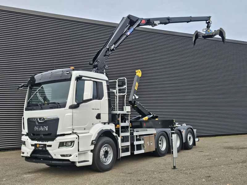 MAN TGS 35.470 8x4 / HMF 2243 Z KRAAN + HAAKARM - Hook lift truck, Crane truck: picture 1 MAN TGS 35.470 8x4 / HMF 2243 Z KRAAN + HAAKARM - Hook lift truck, Crane truck: picture 1