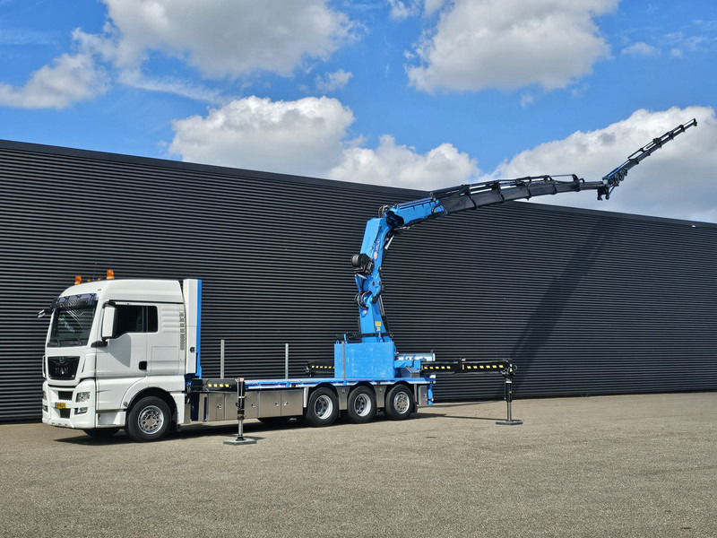 MAN TGX 35.480 8x4-4 / HMF 85 t/m + JIB / WINCH - Dropside/ Flatbed truck, Crane truck: picture 1 MAN TGX 35.480 8x4-4 / HMF 85 t/m + JIB / WINCH - Dropside/ Flatbed truck, Crane truck: picture 1
