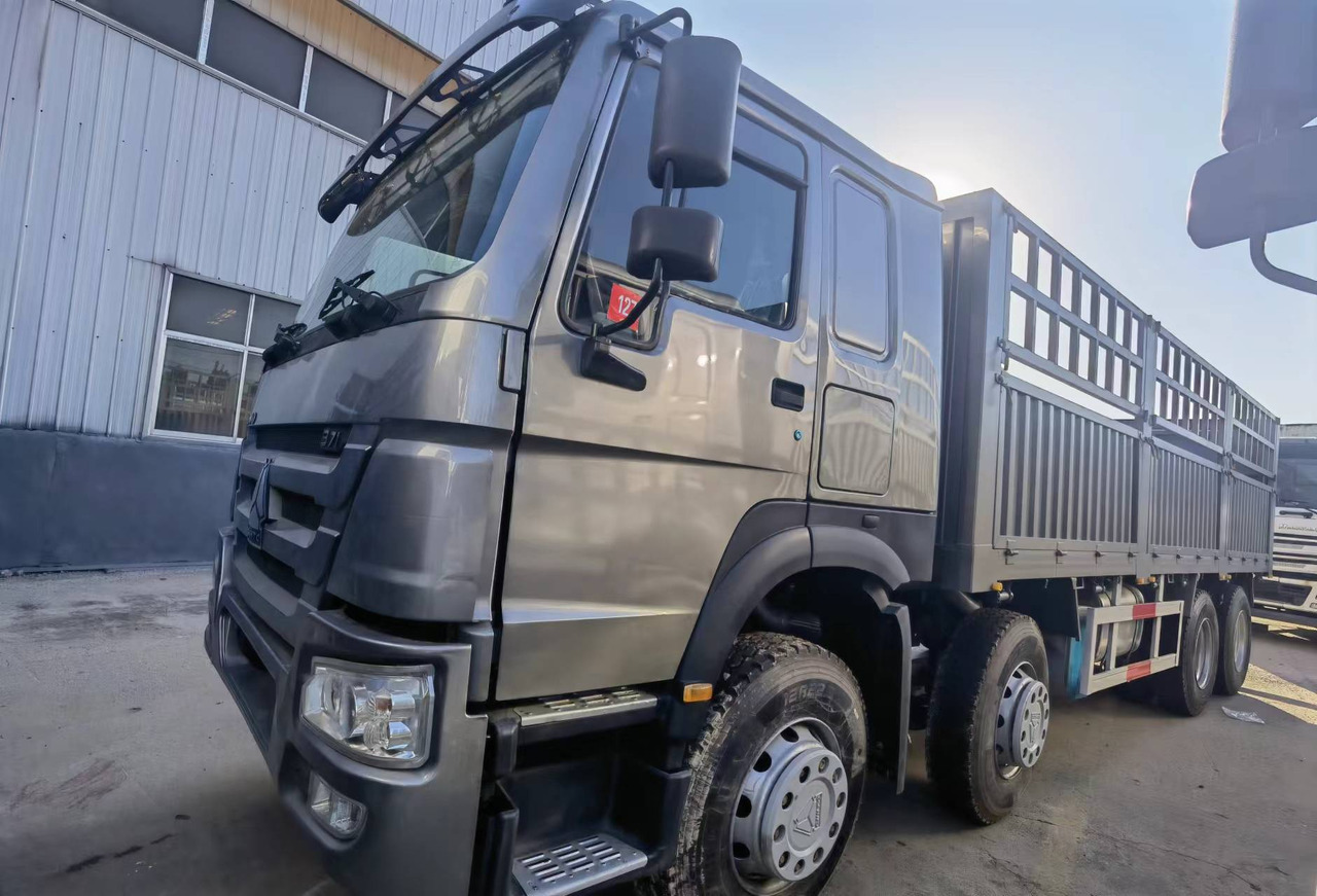 Sinotruk HOWO 371 8*4 Fence truck - Dropside/ Flatbed truck: picture 1 Sinotruk HOWO 371 8*4 Fence truck - Dropside/ Flatbed truck: picture 1