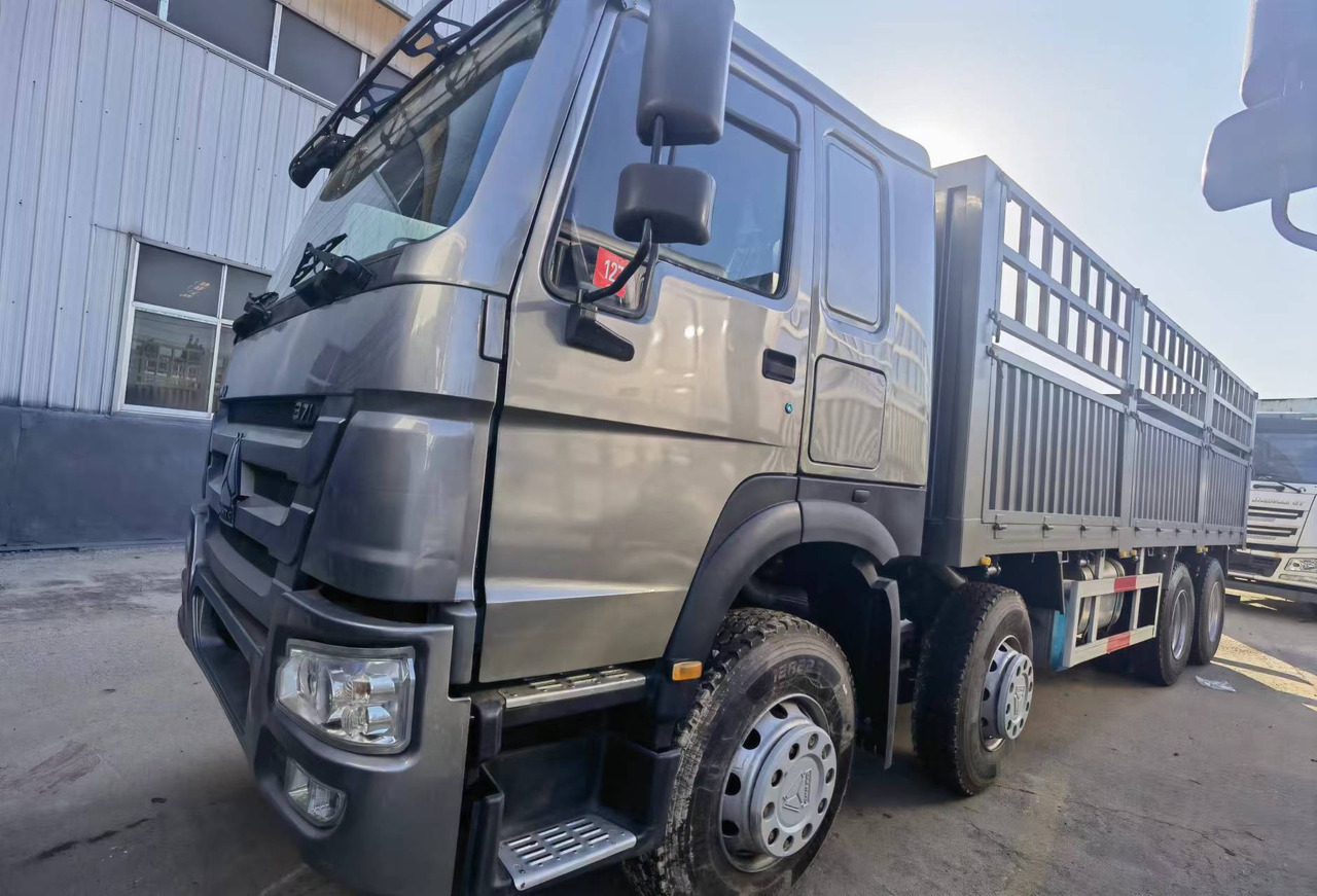 Sinotruk HOWO 371 8*4 Fence truck - Dropside/ Flatbed truck: picture 5 Sinotruk HOWO 371 8*4 Fence truck - Dropside/ Flatbed truck: picture 5