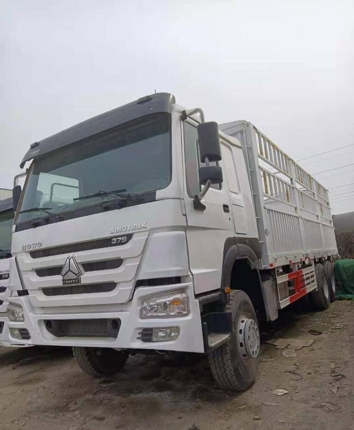 Sinotruk HOWO 6*4 - Dropside/ Flatbed truck: picture 1 Sinotruk HOWO 6*4 - Dropside/ Flatbed truck: picture 1
