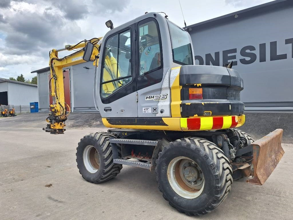 New Holland MYYTY! SOLD! MH2.6 ENGCON PIHDEILLÄ - Wheel excavator: picture 2 New Holland MYYTY! SOLD! MH2.6 ENGCON PIHDEILLÄ - Wheel excavator: picture 2