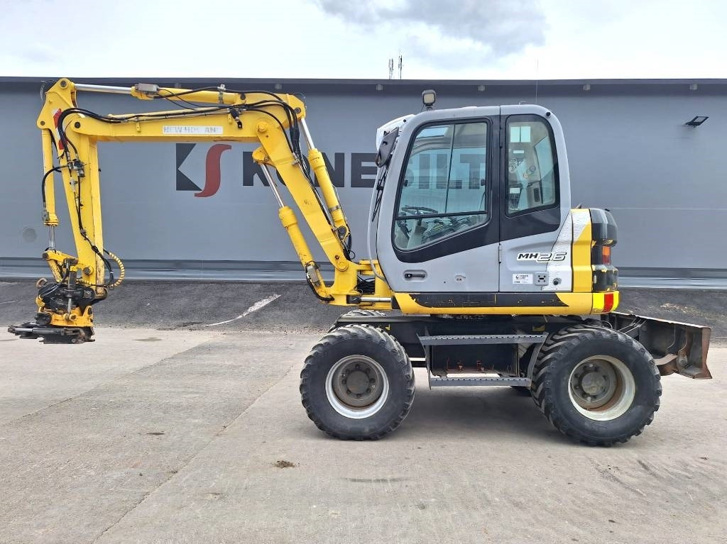 New Holland MYYTY! SOLD! MH2.6 ENGCON PIHDEILLÄ - Wheel excavator: picture 1 New Holland MYYTY! SOLD! MH2.6 ENGCON PIHDEILLÄ - Wheel excavator: picture 1