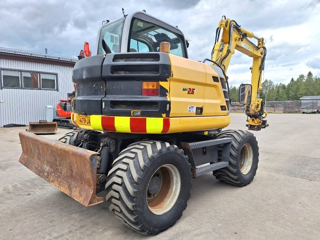 New Holland MYYTY! SOLD! MH2.6 ENGCON PIHDEILLÄ - Wheel excavator: picture 4 New Holland MYYTY! SOLD! MH2.6 ENGCON PIHDEILLÄ - Wheel excavator: picture 4