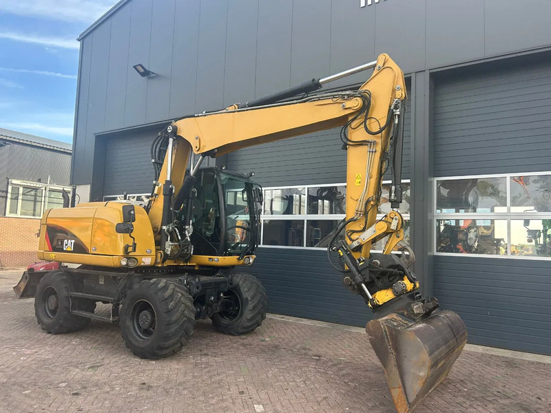 Caterpillar M313D - Wheel excavator: picture 3 Caterpillar M313D - Wheel excavator: picture 3