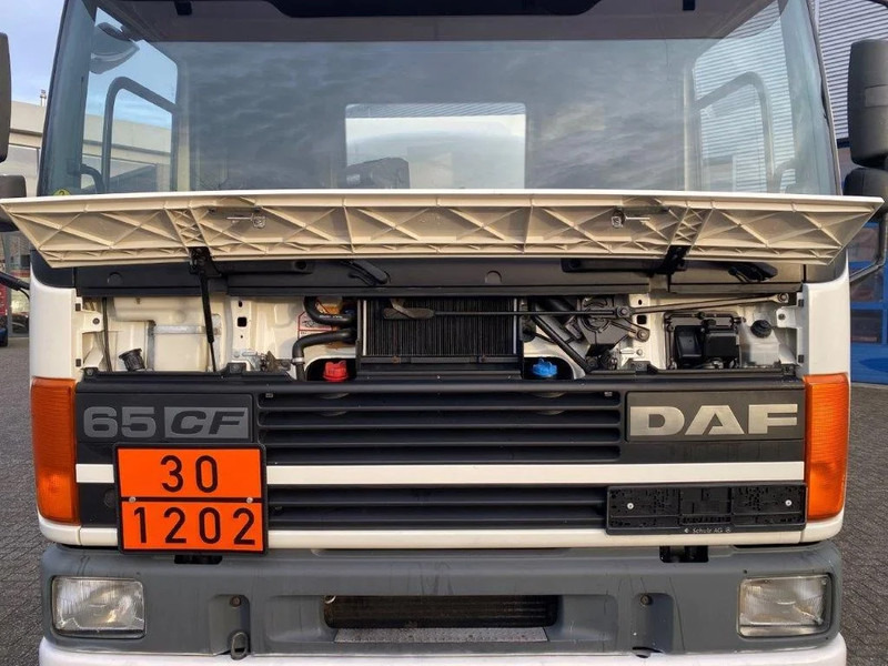 Tank truck DAF 65CF-240 / FULL STEEL / POMP / 3 COMPARTIMENTS / 8350 LITER / ONLY:25969 KM / EURO-2 / MANUAL / GOOD CONDITION: picture 7 Tank truck DAF 65CF-240 / FULL STEEL / POMP / 3 COMPARTIMENTS / 8350 LITER / ONLY:25969 KM / EURO-2 / MANUAL / GOOD CONDITION: picture 7