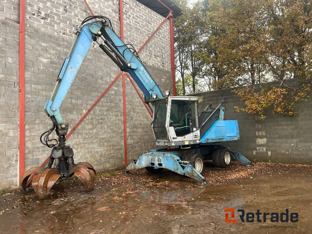 Knusnings- og sorteringsudstyr FUCHS MHL 320 - Skrot sorteringskran - Waste/ Industry handler: picture 1 Knusnings- og sorteringsudstyr FUCHS MHL 320 - Skrot sorteringskran - Waste/ Industry handler: picture 1