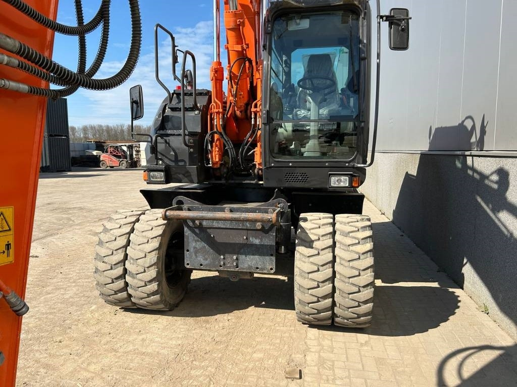 Wheel excavator Hitachi ZX 140 W-5B: picture 8