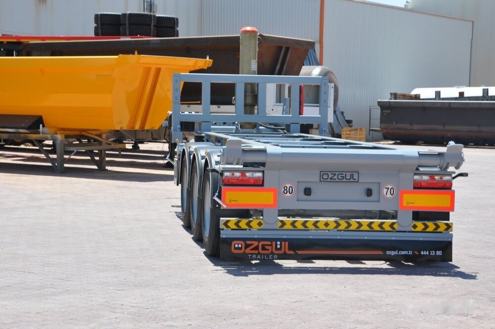 Özgül 40 FT TIPPING CONTAINER CHASSIS AINER CARRIER - Container transporter/ Swap body semi-trailer: picture 1 Özgül 40 FT TIPPING CONTAINER CHASSIS AINER CARRIER - Container transporter/ Swap body semi-trailer: picture 1