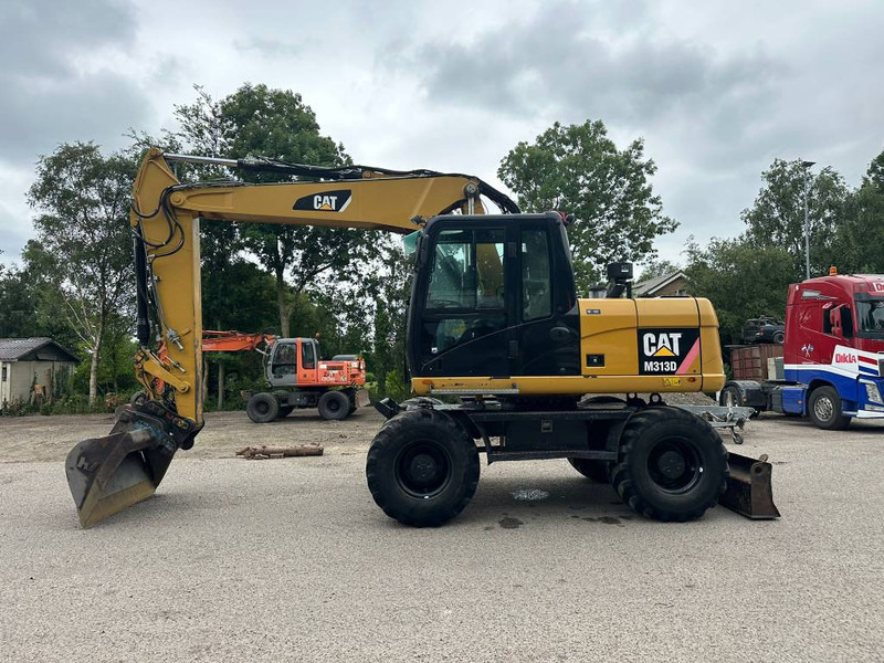 Cat M 313 D - Wheel excavator: picture 1 Cat M 313 D - Wheel excavator: picture 1