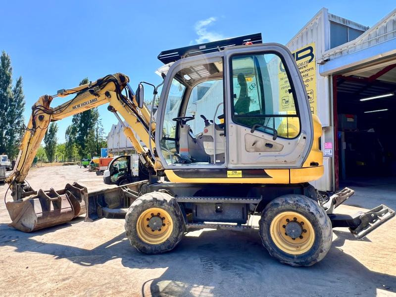 New Holland MH 2.6 PELLE A PNEUS 10T - Wheel excavator: picture 2 New Holland MH 2.6 PELLE A PNEUS 10T - Wheel excavator: picture 2