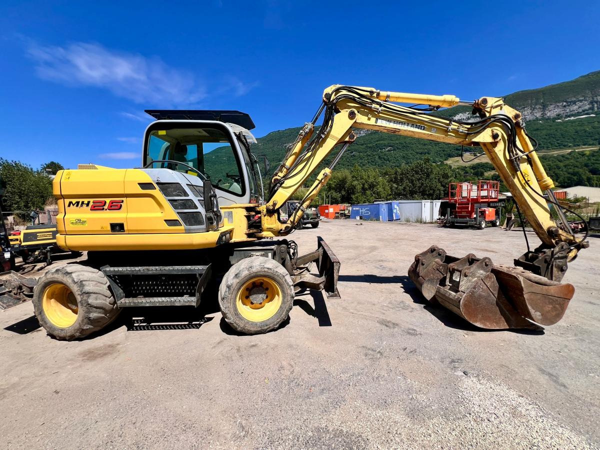 New Holland MH 2.6 PELLE A PNEUS 10T - Wheel excavator: picture 5 New Holland MH 2.6 PELLE A PNEUS 10T - Wheel excavator: picture 5