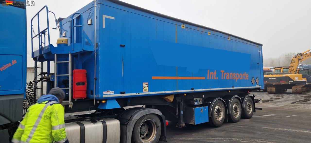 H&W 55 cbm kippmulde | Liftachse - Tipper semi-trailer: picture 1 H&W 55 cbm kippmulde | Liftachse - Tipper semi-trailer: picture 1