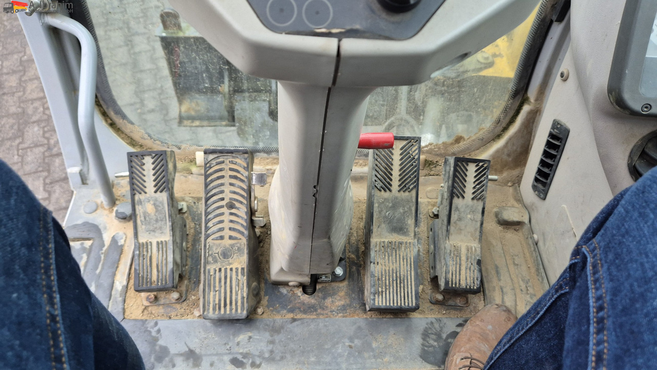 New Holland MH 2.6 Zustand gut, deutsche Maschine incl. Greifer und Dreservo - Wheel excavator: picture 5 New Holland MH 2.6 Zustand gut, deutsche Maschine incl. Greifer und Dreservo - Wheel excavator: picture 5