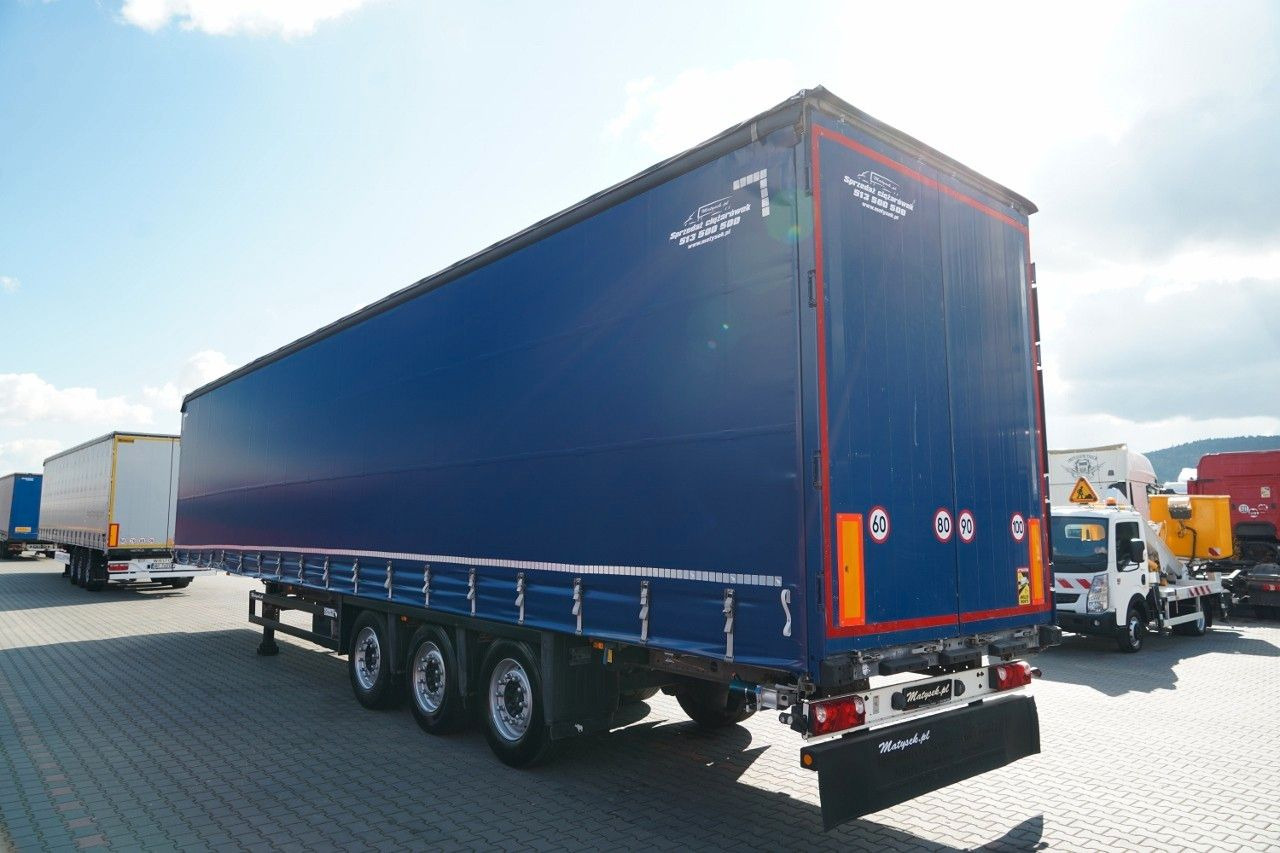 Schmitz Cargobull FIRANKA VARIOS / PODNOSZONY DACH / OPONY 385/55 - Curtainsider semi-trailer: picture 5 Schmitz Cargobull FIRANKA VARIOS / PODNOSZONY DACH / OPONY 385/55 - Curtainsider semi-trailer: picture 5