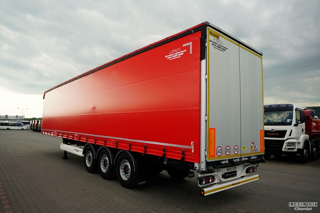 WIELTON / FIRANKA STANDARD / MULDA DO STALI - 9 M / OŚ PODNOSZONA / DACH PODNOSZONY / SAF / - Curtainsider semi-trailer: picture 4 WIELTON / FIRANKA STANDARD / MULDA DO STALI - 9 M / OŚ PODNOSZONA / DACH PODNOSZONY / SAF / - Curtainsider semi-trailer: picture 4