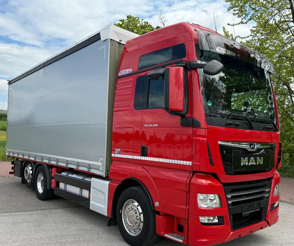 MAN TGX 26.500/LIFT/6X2/KLIMA POSTOJOWA/18PALET/E6/FIRANKA/WINDA/NISKI PRZEBIEG/JEDEN WŁAŚCICIEL/PODWIESZANA OŚ - Curtainsider truck: picture 1 MAN TGX 26.500/LIFT/6X2/KLIMA POSTOJOWA/18PALET/E6/FIRANKA/WINDA/NISKI PRZEBIEG/JEDEN WŁAŚCICIEL/PODWIESZANA OŚ - Curtainsider truck: picture 1