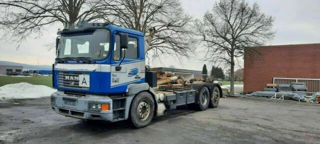 MAN 26.314K 6x2 Blatt/Luft Diff/Sperre - Hook lift truck: picture 1 MAN 26.314K 6x2 Blatt/Luft Diff/Sperre - Hook lift truck: picture 1