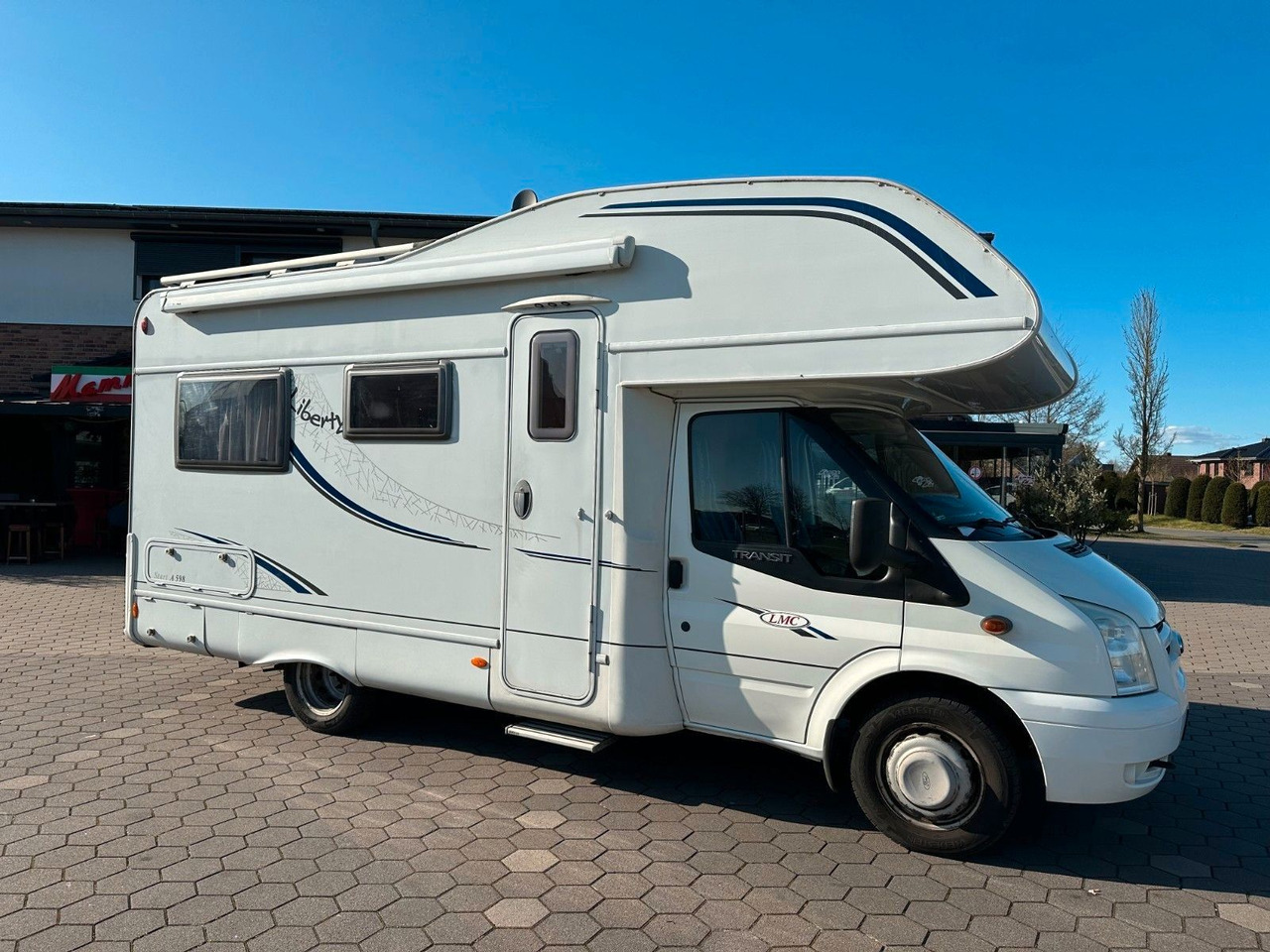 Alcove motorhome LMC Liberty A 598/1.Hand/Rundsitzgruppe/Markise/AHK: picture 1