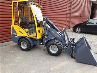 Eurotrac W11 med lang arm, førerhus, skovl og gafler - Compact loader: picture 1 Eurotrac W11 med lang arm, førerhus, skovl og gafler - Compact loader: picture 1