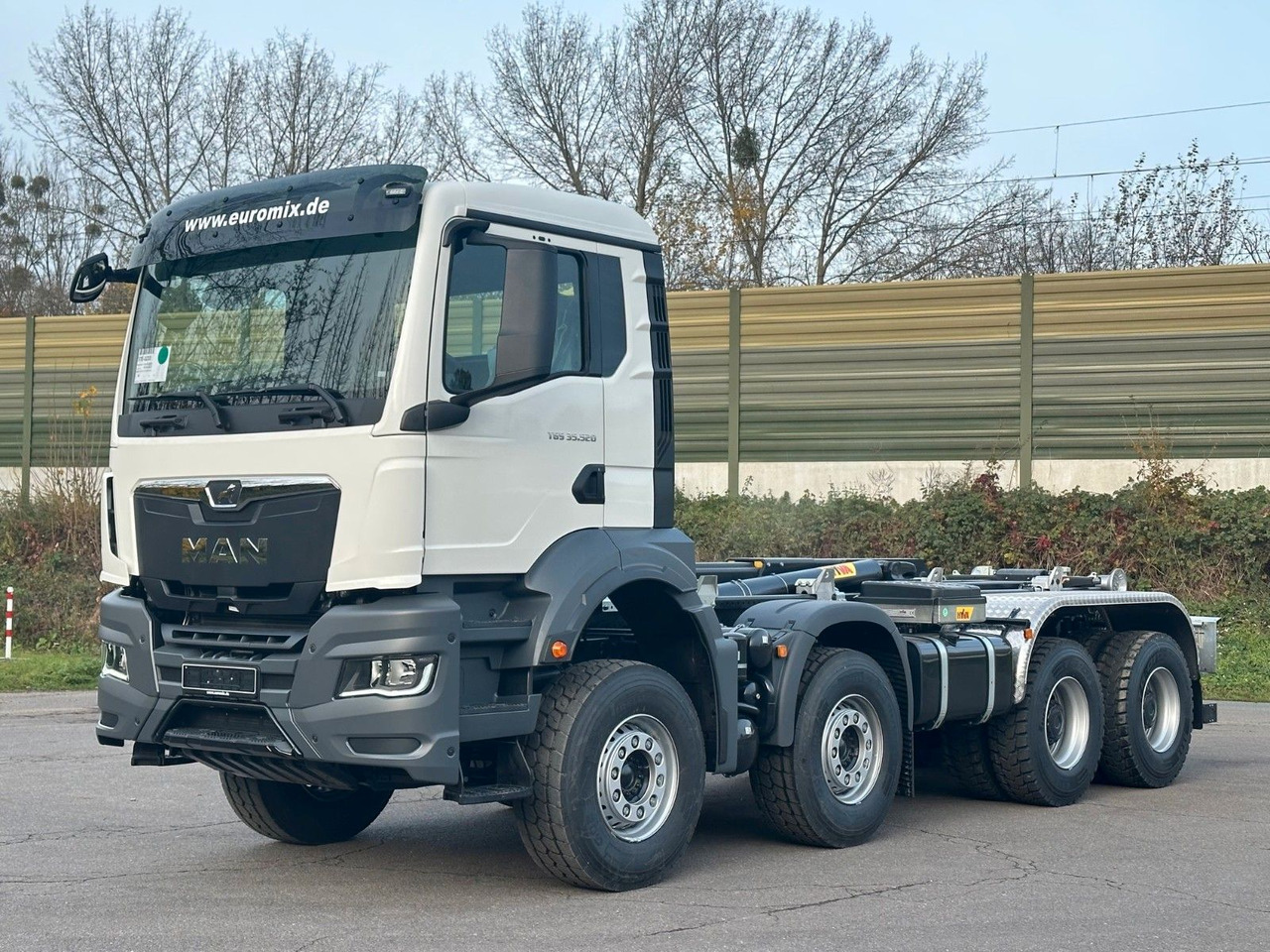 MAN TGS 35.520 8x4 Euro6e Hyva 26-55 Abrollkipper - Hook lift truck: picture 2 MAN TGS 35.520 8x4 Euro6e Hyva 26-55 Abrollkipper - Hook lift truck: picture 2