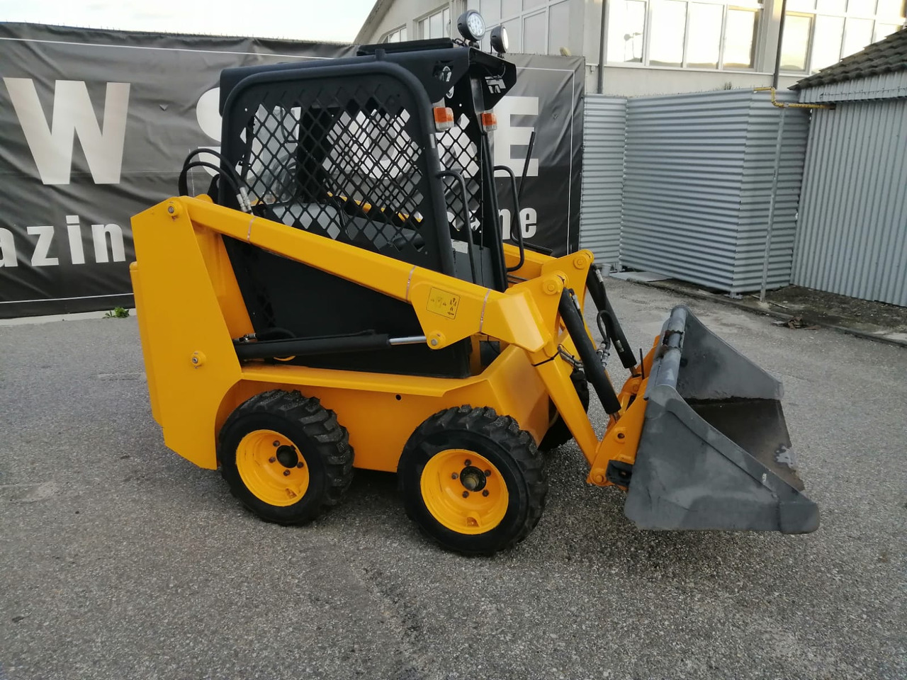 Skid steer loader Bobcat Front Loader Ram Italia FM 120 – Hammer Installation: picture 7