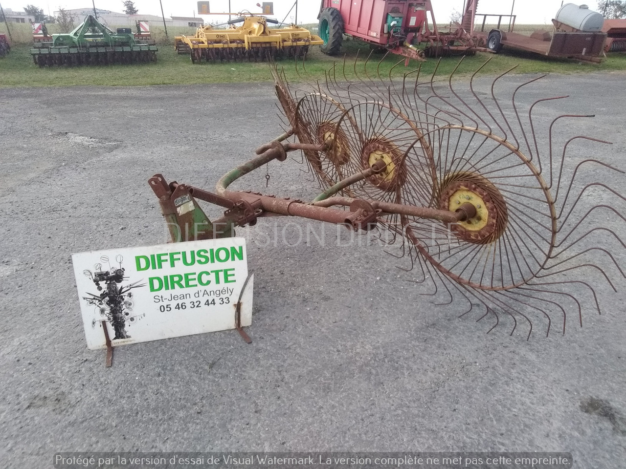 JOHN DEERE ANDAINEUR P 140 - Tedder/ Rake: picture 1 JOHN DEERE ANDAINEUR P 140 - Tedder/ Rake: picture 1