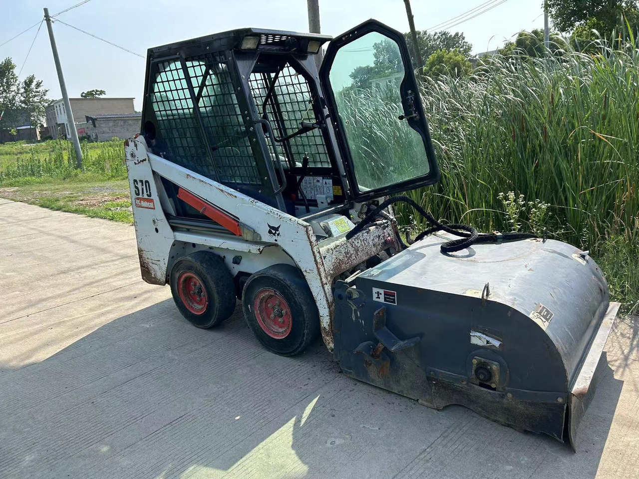 BOBCAT S70 Sliding Sweeper Click for Discount - Skid steer loader: picture 3 BOBCAT S70 Sliding Sweeper Click for Discount - Skid steer loader: picture 3