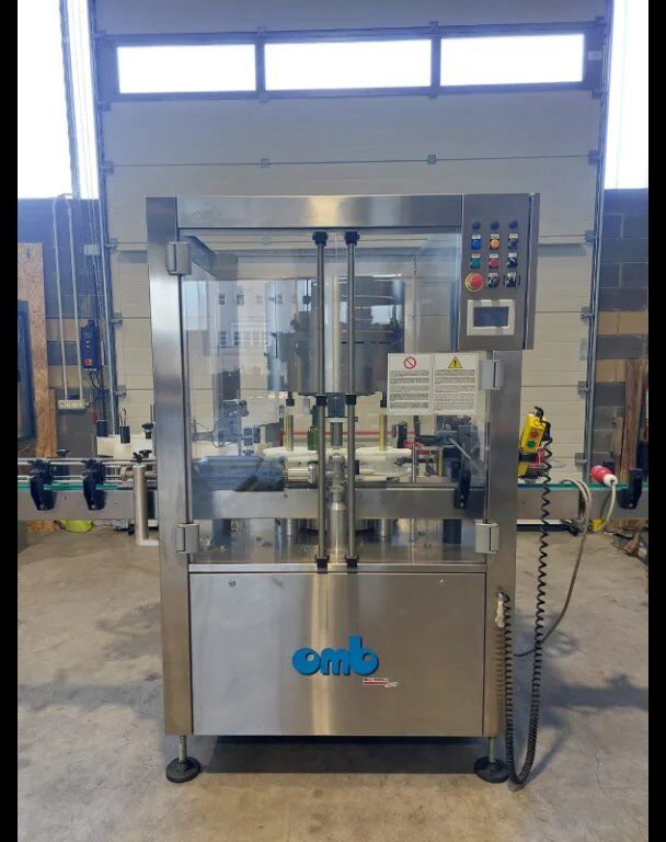 Used OMB labelling machine 4 heads 3000 BPH - Labeling machine: picture 1 Used OMB labelling machine 4 heads 3000 BPH - Labeling machine: picture 1