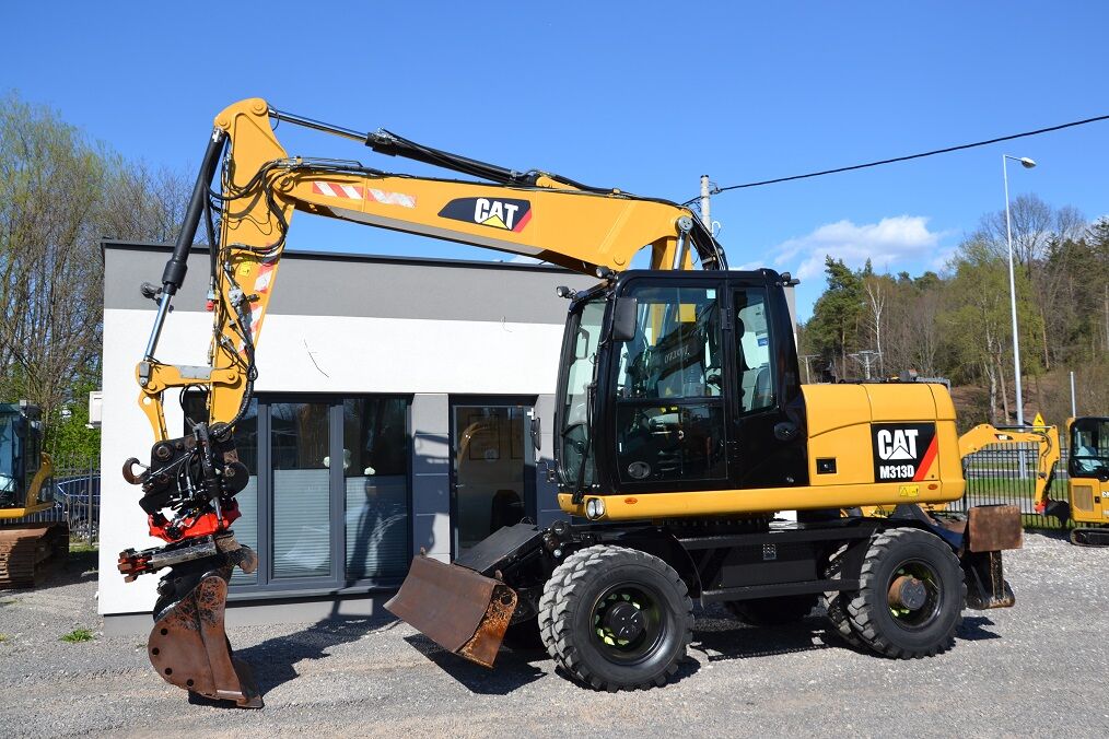 CATERPILLAR M 313 D ROTOTILT - Wheel excavator: picture 1 CATERPILLAR M 313 D ROTOTILT - Wheel excavator: picture 1