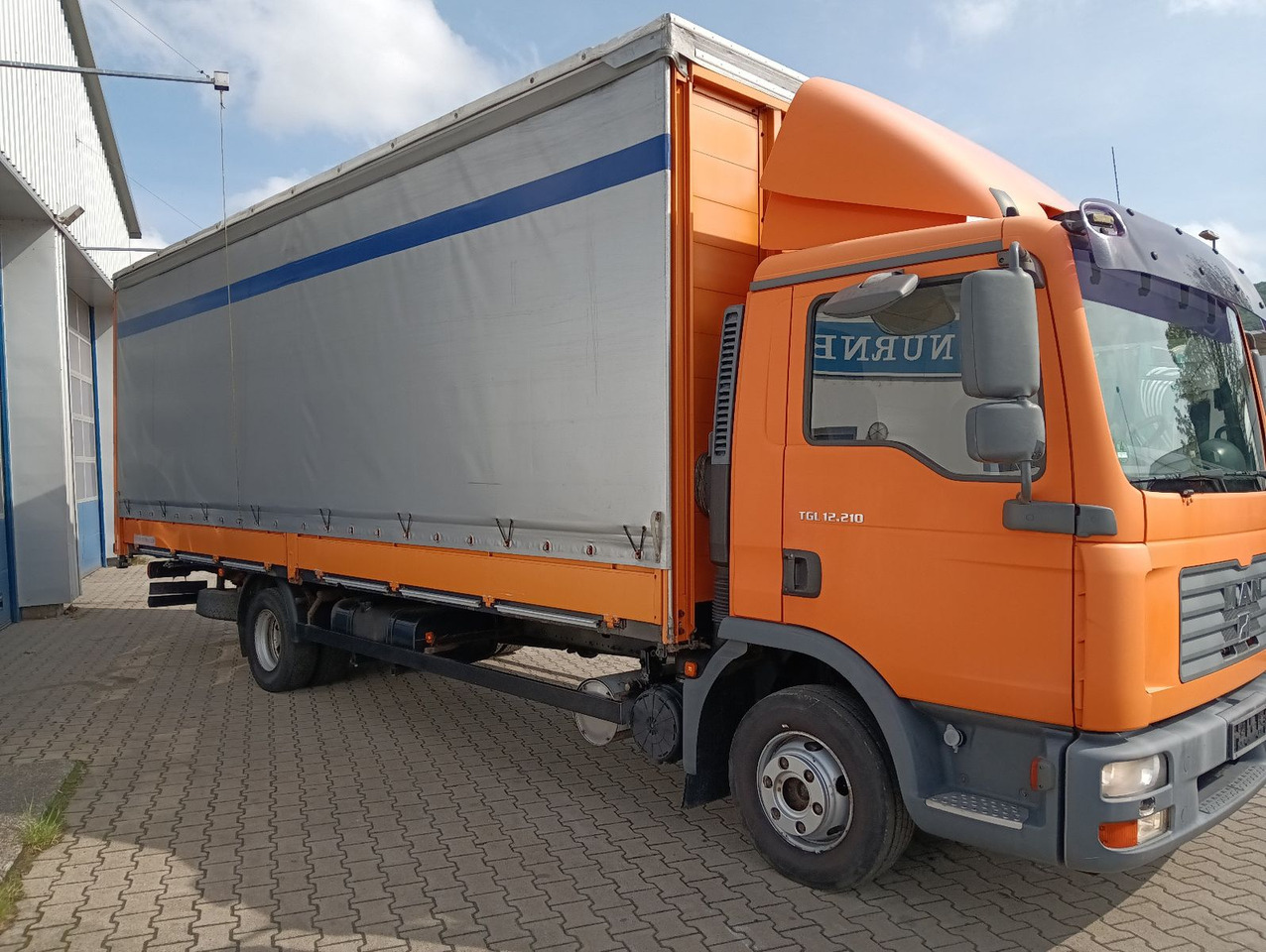 MAN TGL 12.210 4x2 KLIMA,AHK, 7,3m SCHWARZMÜLLER TÜV - Curtainsider truck: picture 5 MAN TGL 12.210 4x2 KLIMA,AHK, 7,3m SCHWARZMÜLLER TÜV - Curtainsider truck: picture 5