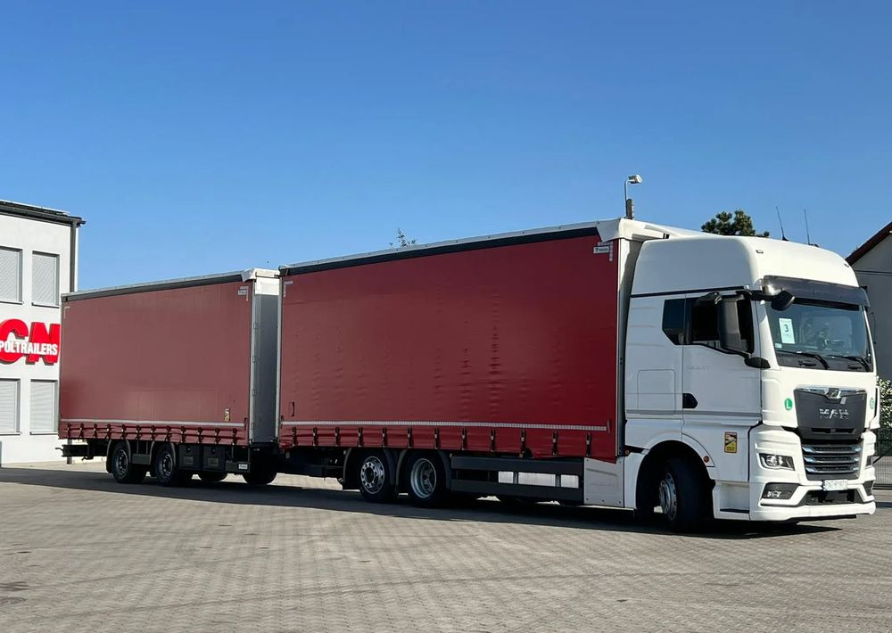 MAN TGX 26.470 z przyczepą Redos - Curtainsider truck: picture 2 MAN TGX 26.470 z przyczepą Redos - Curtainsider truck: picture 2