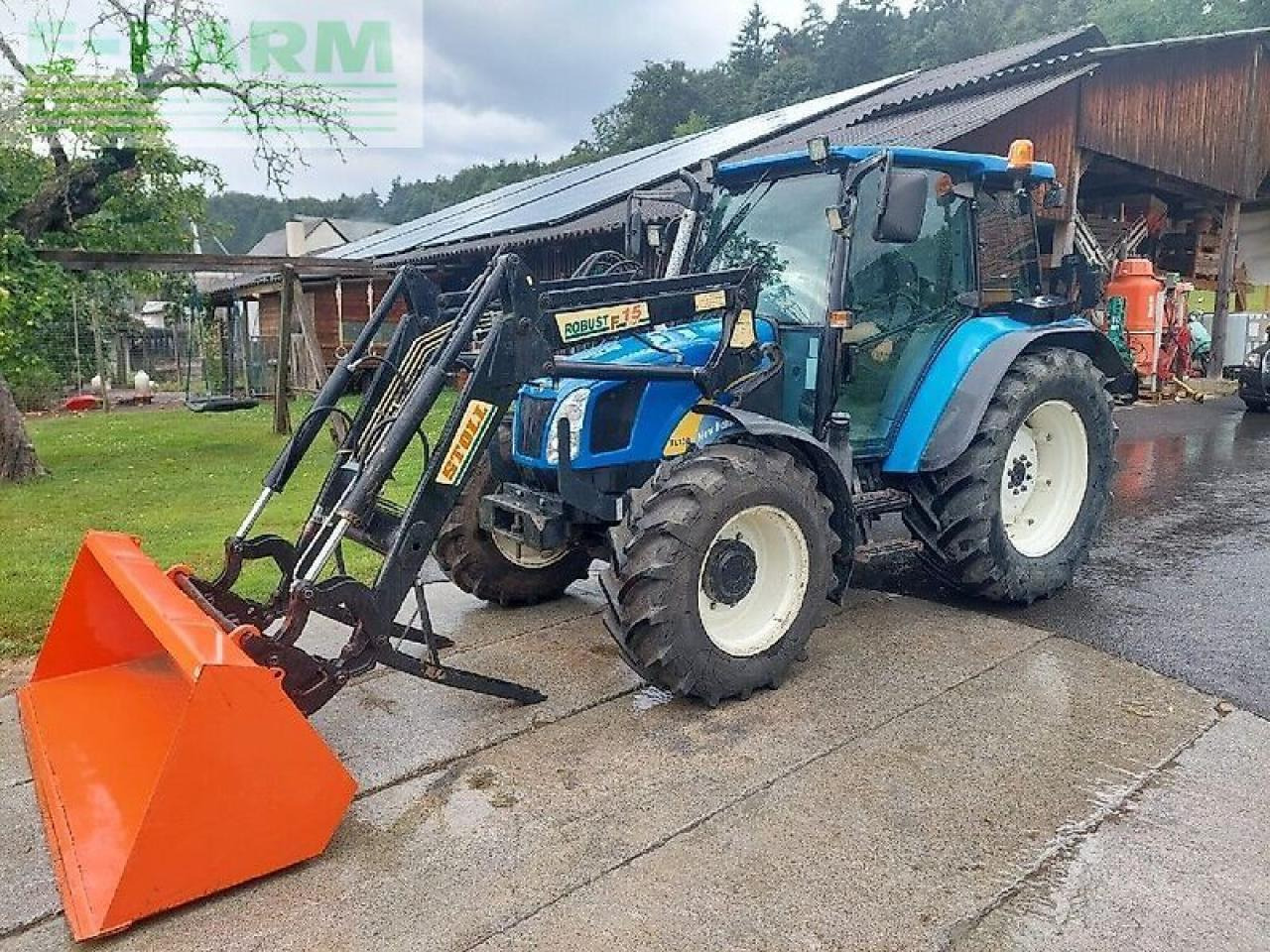New Holland tl 90 a A - Farm tractor: picture 1 New Holland tl 90 a A - Farm tractor: picture 1